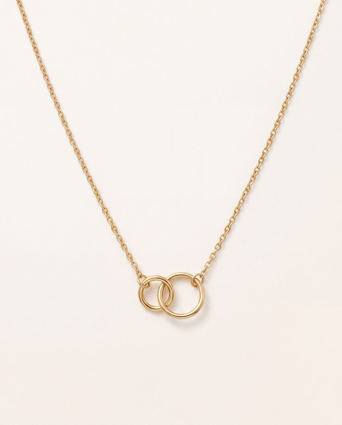 Halskette mit zwei verschlungenen Ringen aus 750er Gold