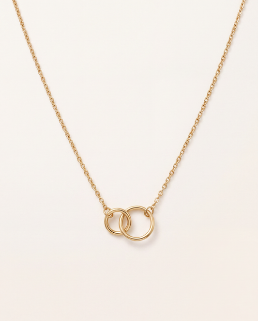 Halskette mit zwei verschlungenen Ringen aus 750er Gold